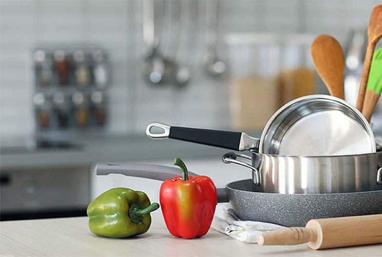 Modern Kitchen Countertop with fruit and cooking utensils