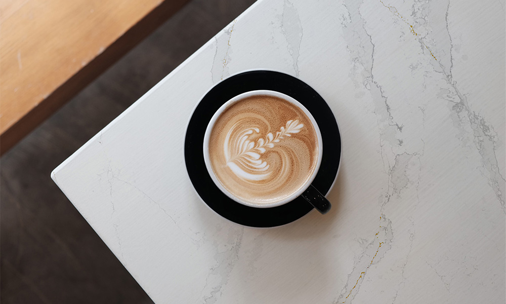Modern white countertop with coffee cup