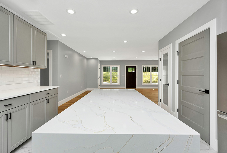KItchen Island with Waterfall sides in Calacatta Gold Engineered Quartz Stone