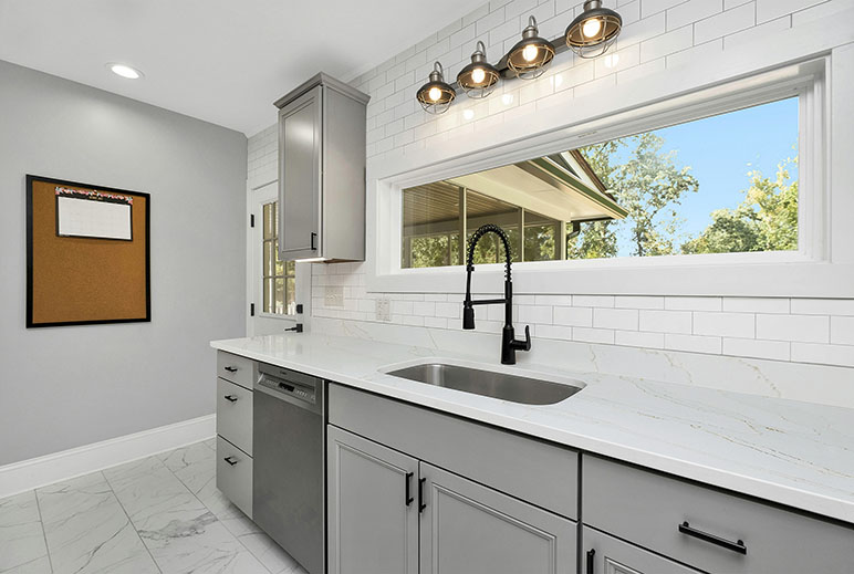 Calacatta Gold Worktop with under-rmounted sink and taps